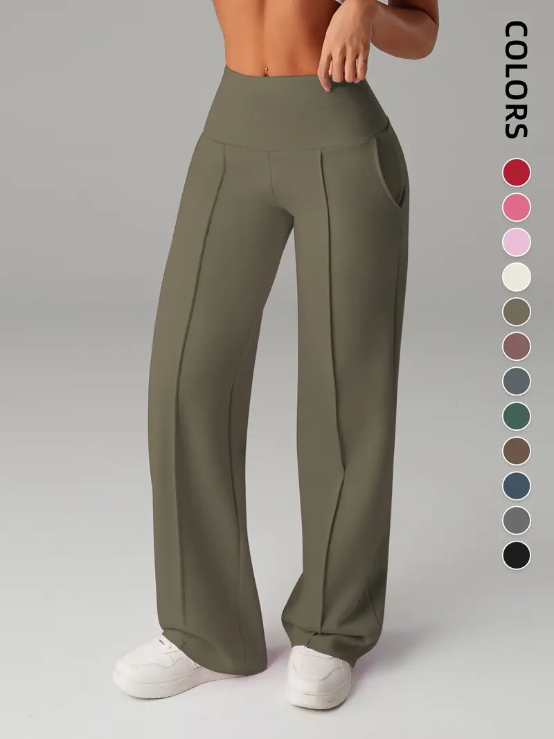 Pantalones de mujer de tiro medio, cintura elástica y pernera ancha; estilo deportivo casual, cómodos bolsillos laterales; prenda versátil para primavera y otoño; ideales para el día a día; moda femenina.